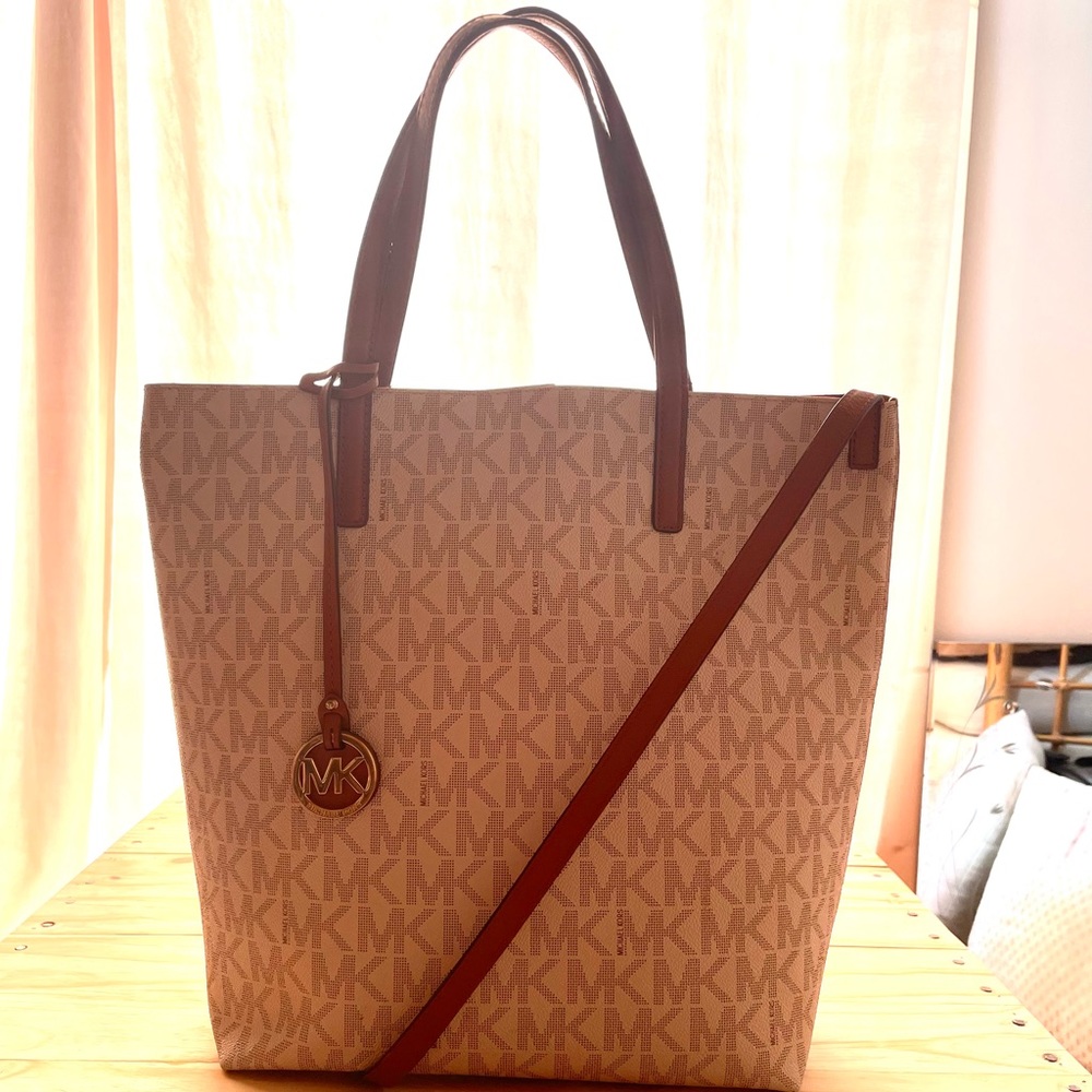 Michael Kors monogram deep bucket tote bag.